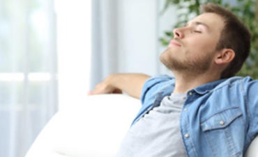 A man sitting on a couch